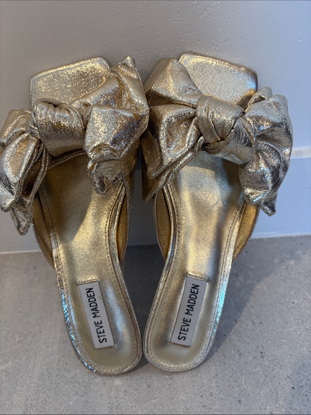 Steve Madden Metallic Knot Bow Slide Sandals in Gold